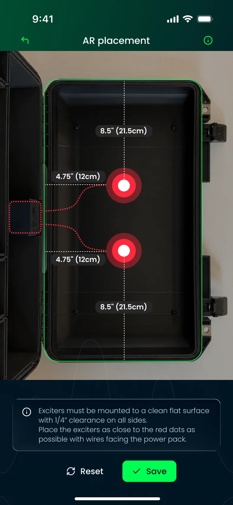 AR placement screen marking two red exciter mounting points inside the case, 4.75 inches from the side and 8.5 inches from each end, with wire routes to the power pack